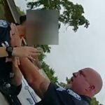 Cop Seen On Video Grabbing Fellow Officer By Her Throat